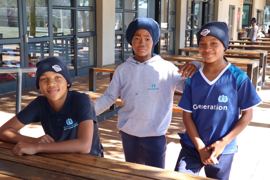Rising Stars bursary students smiling in the classroom